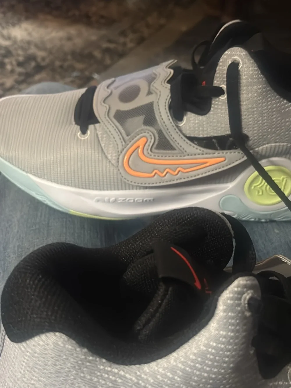 KDs Nike Grey Sneakers with Orange Swoosh and Black Accents